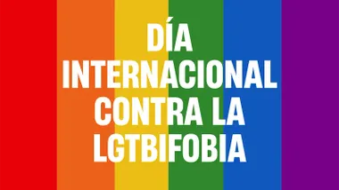 Una parte del cartel de las jornadas, con el fondo de la bandera arcoiris y el lema "Día internacional contra la LGTBIfobia"