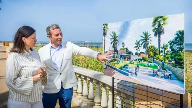 Patricia Cavada observa un diseño de lo que será el nuevo mirador de San Fernando, están en una terraza y observa un diseño.