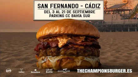 Jugosa hamburguesa en la playa como parte del cartel del Champions Burger.
