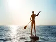 Paddle surf: el deporte acuático que conquista playas, ríos y lagos