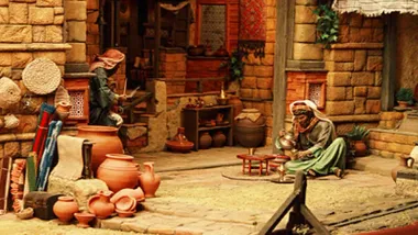 Figuras de un belén expuesto en San Fernando en un entorno imitando la época.