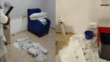 Sillón cubierto y filtraciones de agua en el centro de salud.