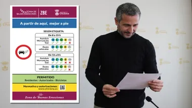 José Vera, con chaleco negro sosteniendo un documento sobre la ZBE que se muestra a la izquierda de la imagen.