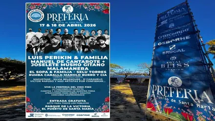 Cartel de la Preferia y parte del recinto ferial con una vela.