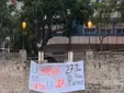 Despliegan una gran lona en Cádiz para llamar a la movilización por la vivienda del 27 de junio