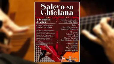 Guitarrista desenfocado y cartel en tonos rojizos de "Salero en Chiclana".